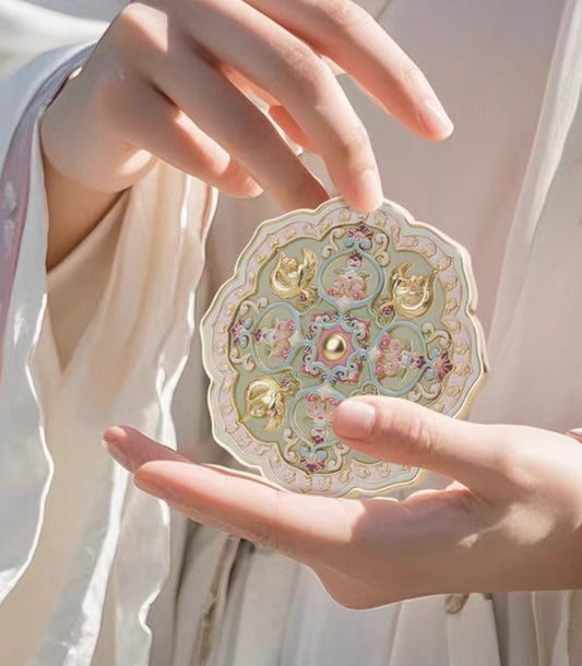 Thousand Springs pocket mirror — cover artwork detail view