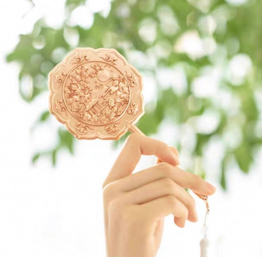 Jade Rabbit handheld mirror — rabbit motif detail view