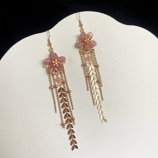 Cherry blossom dangling earrings, detail close-up
