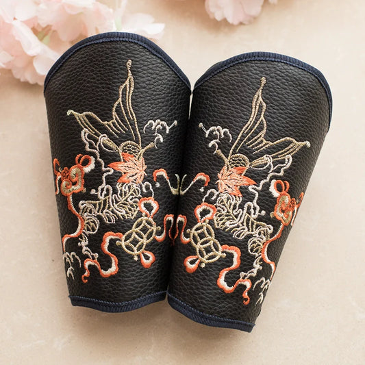 Mist Valley hanfu wrist guards — embroidery detail view